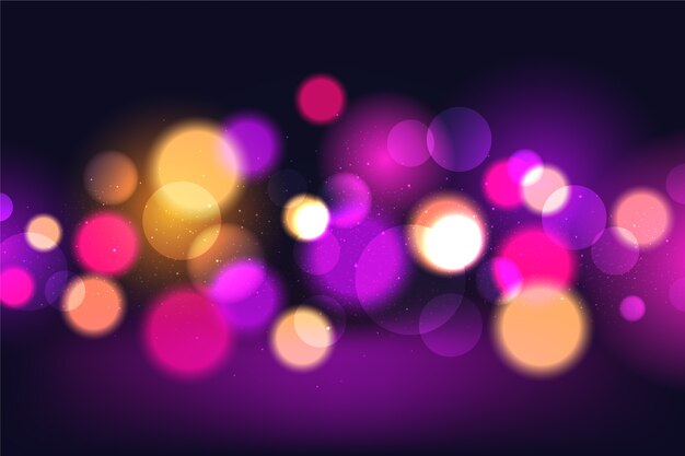 Efecto de luces bokeh en fondo oscuro