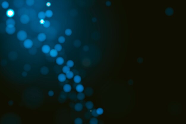 Efecto de luces bokeh en fondo oscuro