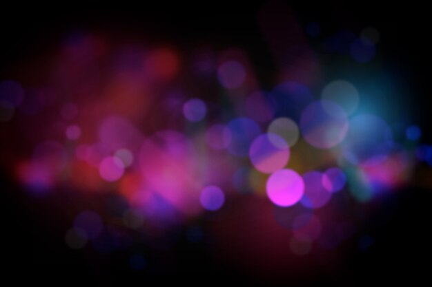 Efecto de luces bokeh en fondo oscuro