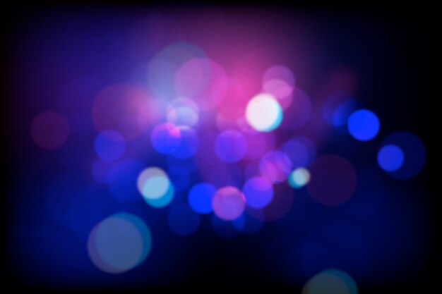 Efecto de luces bokeh en fondo oscuro