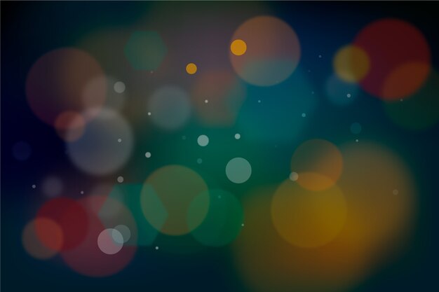 Efecto de luces bokeh en fondo oscuro