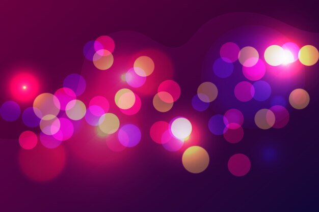 Efecto de luces Bokeh sobre el tema del fondo de pantalla oscuro