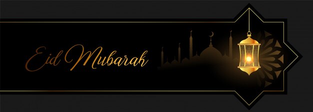 Eid mubarak banner dorado con linterna y mezquita