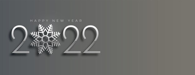 Elegante banner de feliz año nuevo 2022 en estilo copos de nieve