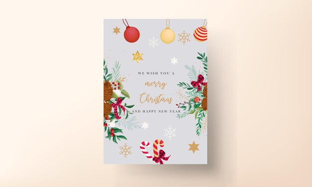 Elegante diseño de tarjeta navideña con adornos navideños y hermosas hojas.