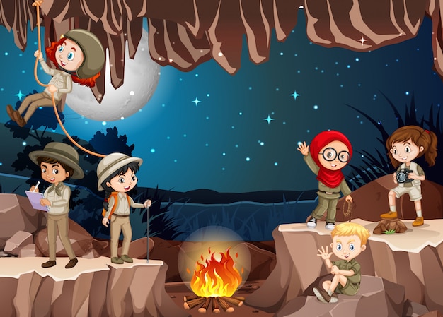Escena con un grupo de exploradores explorando la cueva.