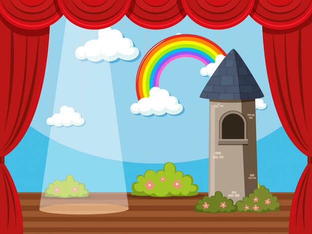 Escenario con torre y arcoiris.