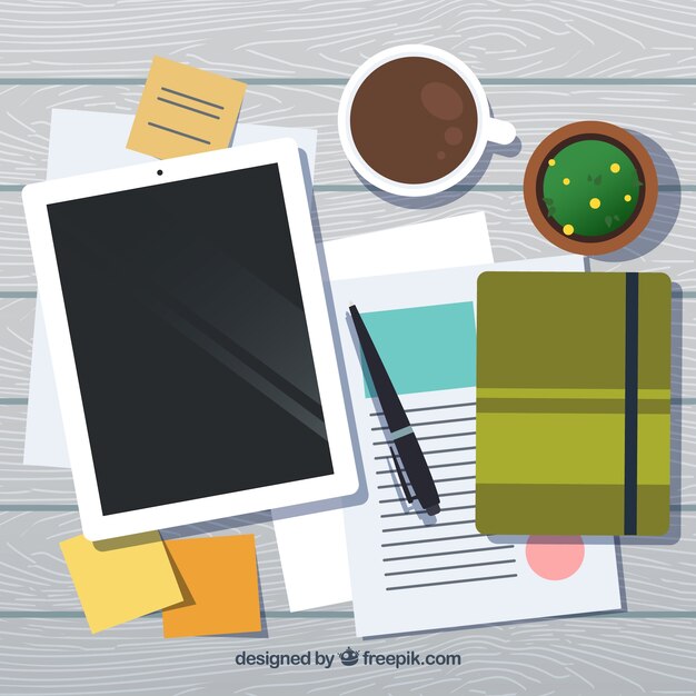 Espacio de trabajo con tablet y libreta