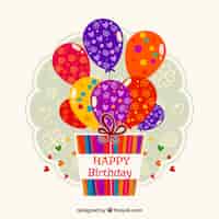 Vector gratuito etiqueta de cumpleaños con regalos y globos