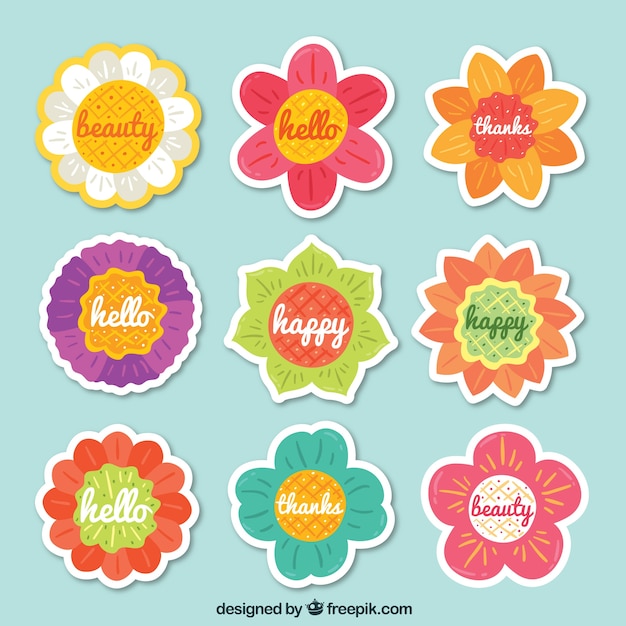 Vector gratuito etiquetas adorables con variedad de flores