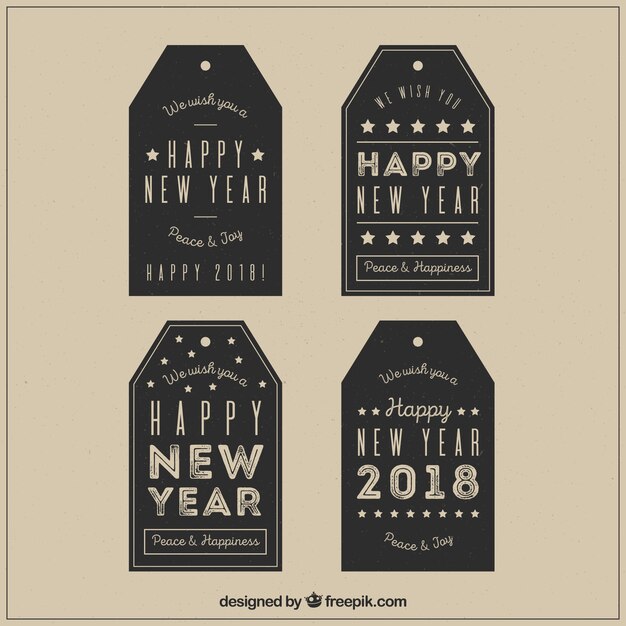 Etiquetas de año nuevo vintage en negro
