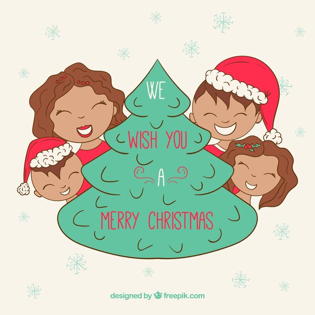 Familia alrededor del árbol de navidad