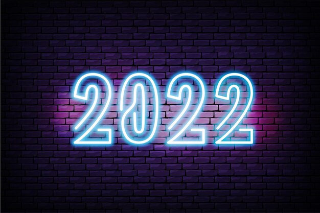 Feliz año nuevo 2022 banner de luz de neón con fondo de pared de ladrillo realista