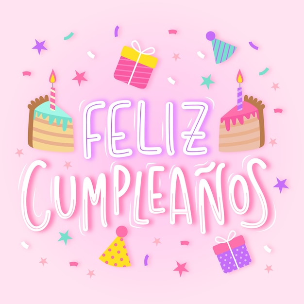 Feliz cumpleaños en letras españolas con pastel