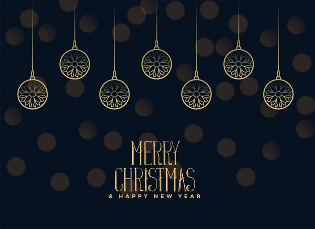 Feliz Navidad colgando bolas sobre fondo oscuro