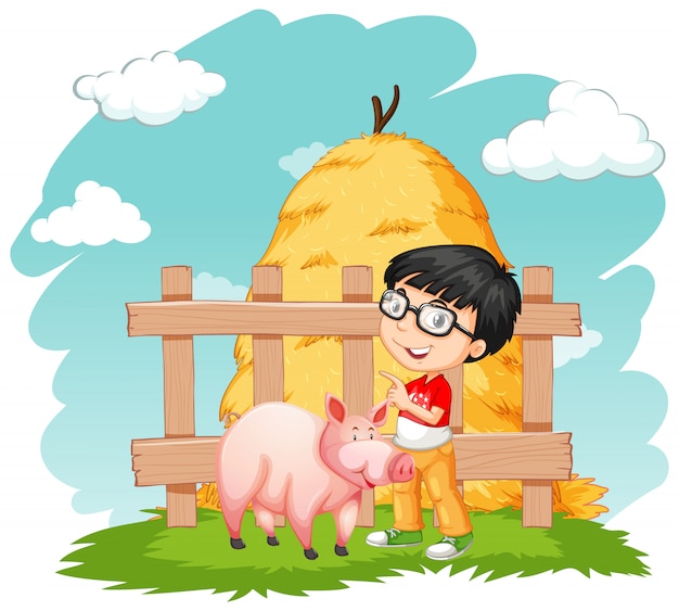 Feliz niño y cerdo en la granja