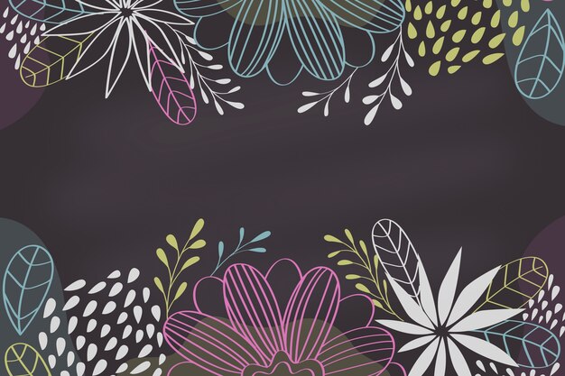 Flores dibujadas a mano sobre fondo de pizarra