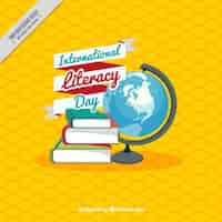 Vector gratuito fondo amarillo con libros y mundo para el día internacional de la alfabetización
