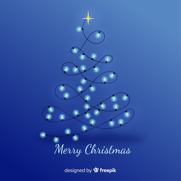 Fondo azul de navidad con árbol de bombillas