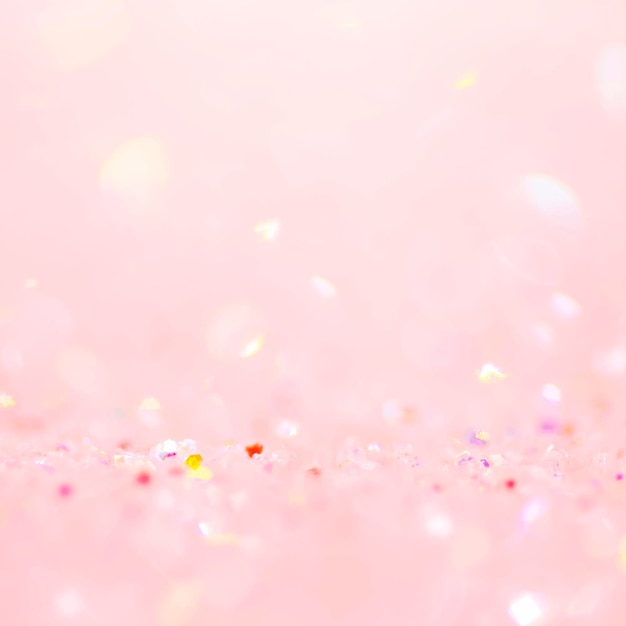 Vector gratuito fondo de bokeh de confeti de brillo rosa suave