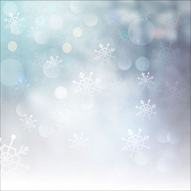 Fondo bokeh de invierno con copos de nieve
