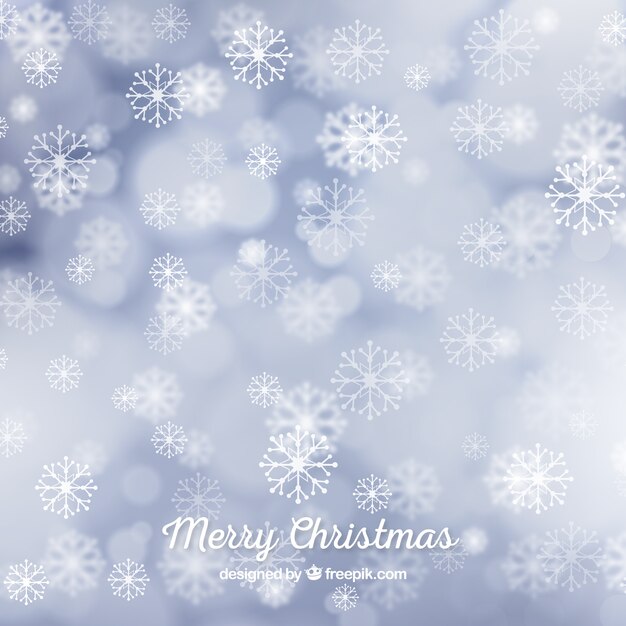 Fondo bokeh de navidad con copos de nieve 