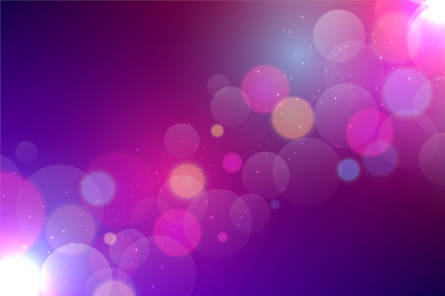 Fondo bokeh púrpura con partículas brillantes