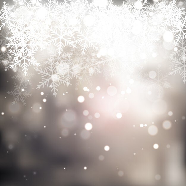 Fondo borroso bokeh con copos de nieve