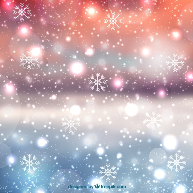 Fondo borroso de navidad con copos de nieve 