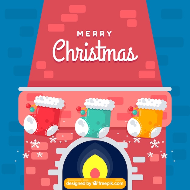 Vector gratuito fondo de chimenea con calcetines navideños en diseño plano