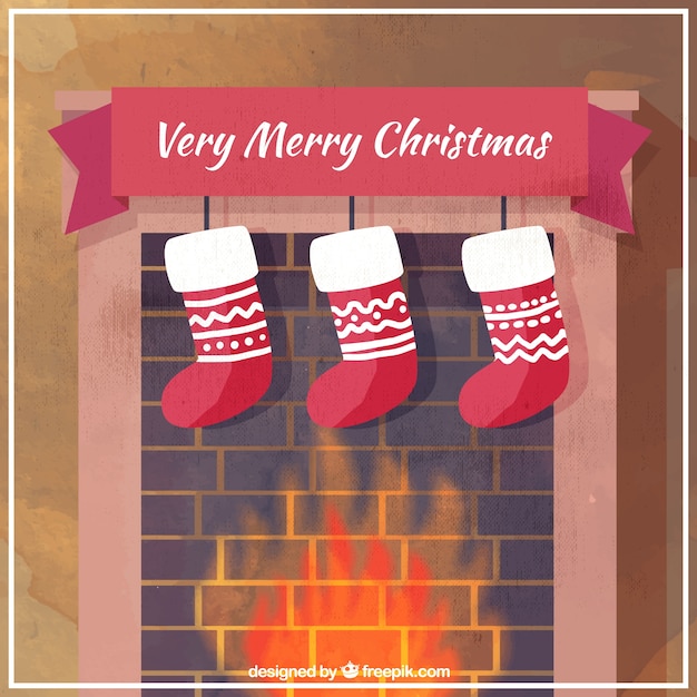 Vector gratuito fondo de chimenea con calcetines navideños