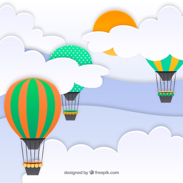 Fondo de cielo con nubes y globos aeroestáticos volandoen textura de papel