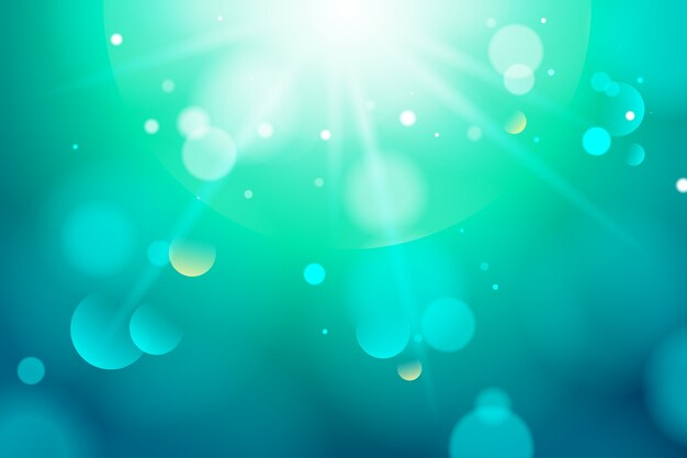 Fondo degradado azul con efecto bokeh