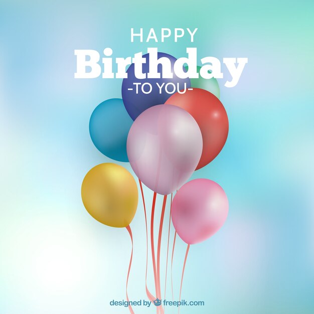 Fondo desenfocado con globos realistas de colores 