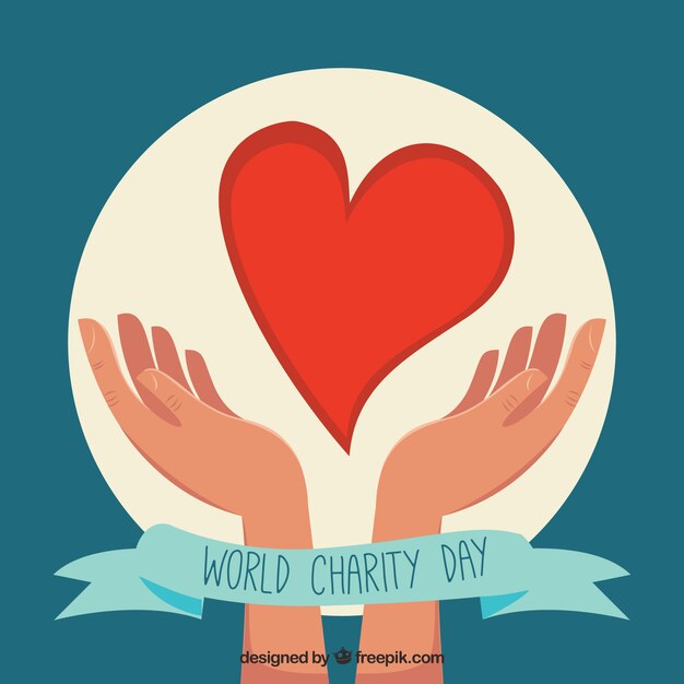 Fondo del día mundial de la caridad de manos con un corazón