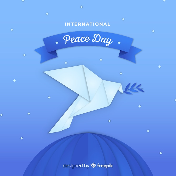Vector gratuito fondo del día de la paz con paloma en origami