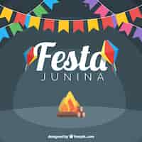 Vector gratuito fondo de festa junina con hoguera y guirnaldas de colores en diseño plano