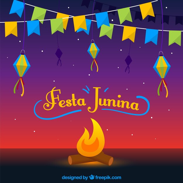 Fondo de fiesta junina con fogata y banderines