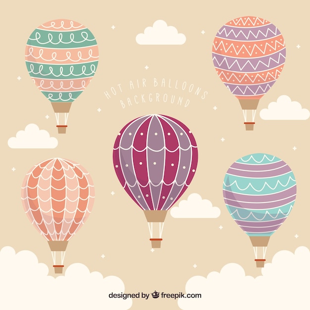 Fondo de globos de aire caliente en el cielo con nubes