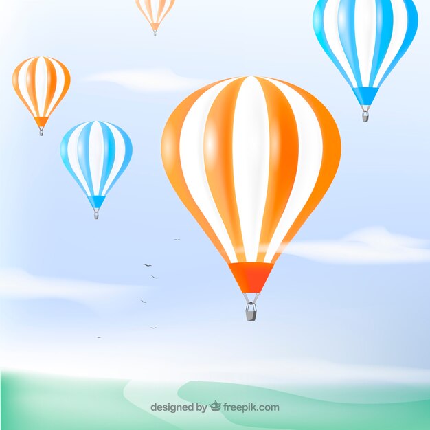 Fondo de globos de aire caliente en el cielo con nubes