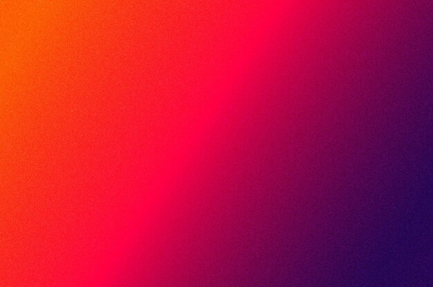 Fondo con gradiente granulado naranja rosa púrpura