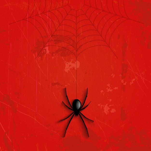 Fondo grunge de halloween con araña que cuelga