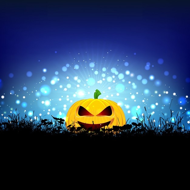 Vector gratuito fondo de halloween con calabaza enclavada en la hierba