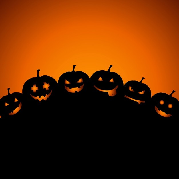 Vector gratuito fondo de halloween con calabazas