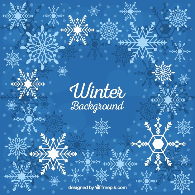 Fondo de invierno con copos de nieve