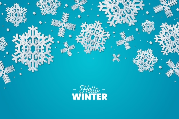 Vector gratuito fondo de invierno en estilo papel con copos de nieve