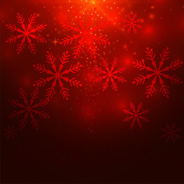 Fondo de inviernos de navidad de copos de nieve que brillan intensamente rojo