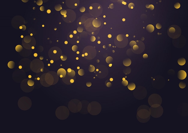 El fondo de las luces doradas de Bokeh