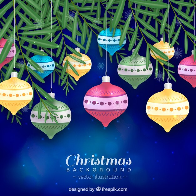 Fondo de navidad con ornamentos realistas