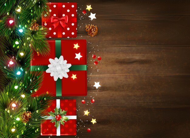Fondo de Navidad con ramas de abeto y cajas de regalo decoradas sobre superficie de madera realista